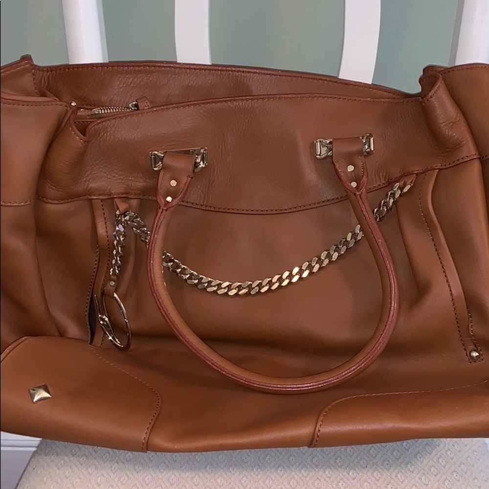 Brand new St. John’s brown tan leather travel bag